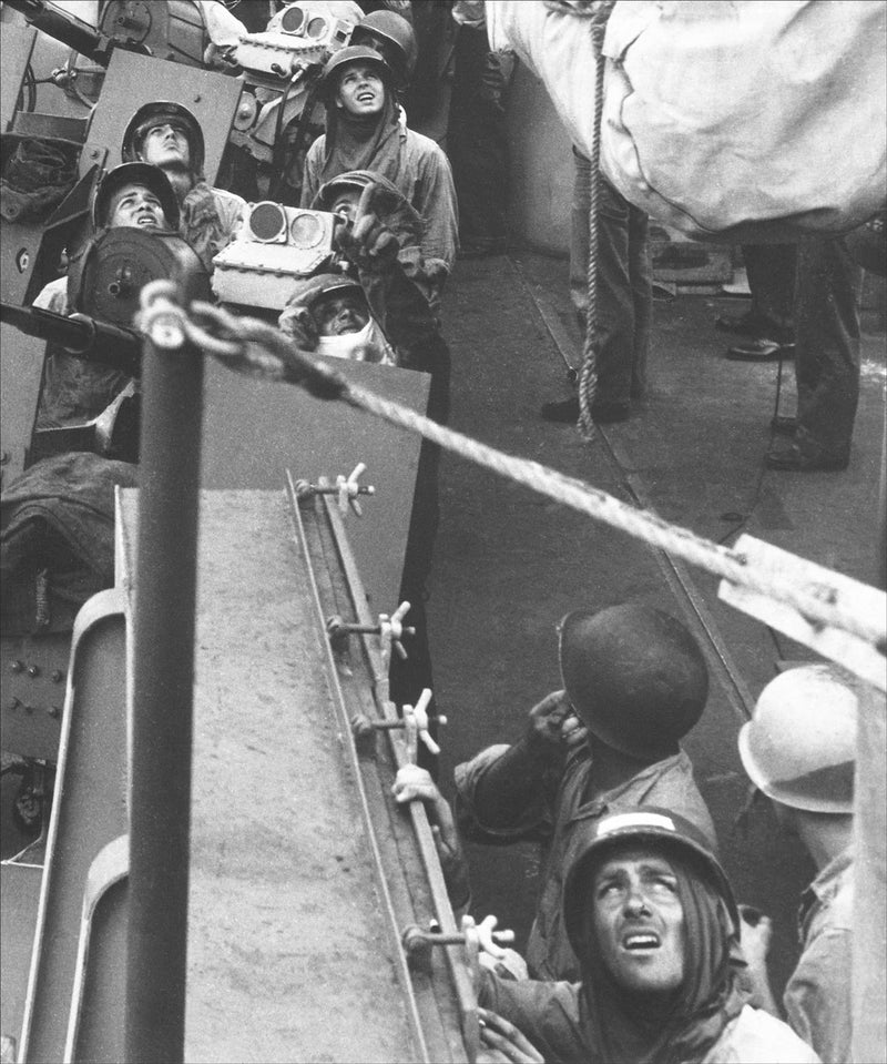 Crewmen Aboard the USS Phoenix Anxiously Glance at the Sky, in a Time of Intense Kamikaze Attacks