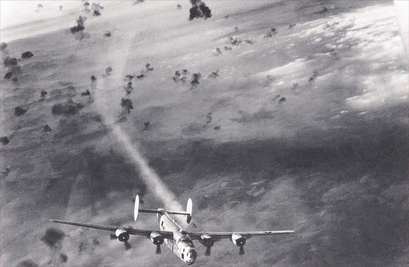 Hit B-29 Liberator Emerges from Flack Area