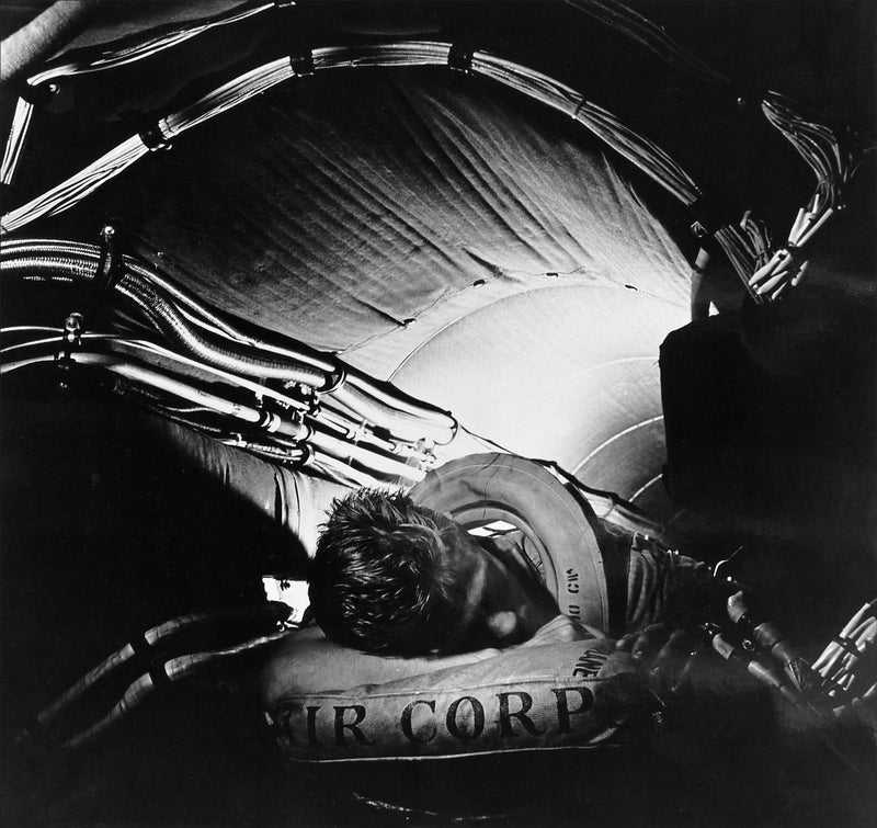 A Crewman Resting Aboard a B-29 Superfortress Bomber