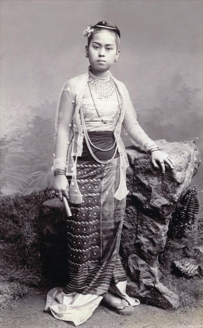 Young Burmese Lady Holding a Cigar