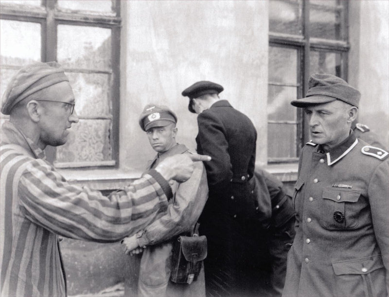 A Pow Points out a Former Nazy Guard at Buchenwald Concentration Camp